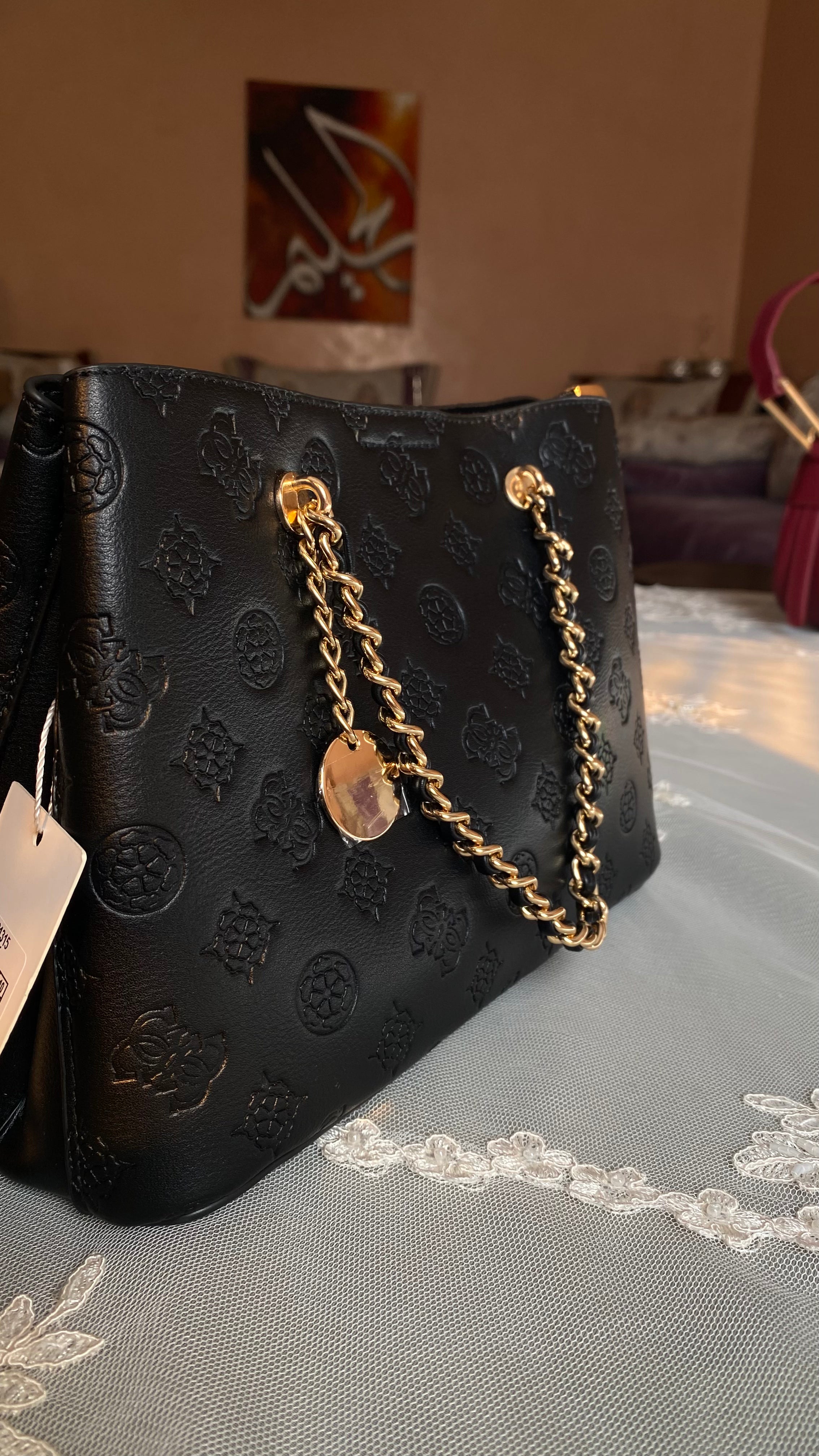 Sac noir avec chaine dorée plus bandoulière