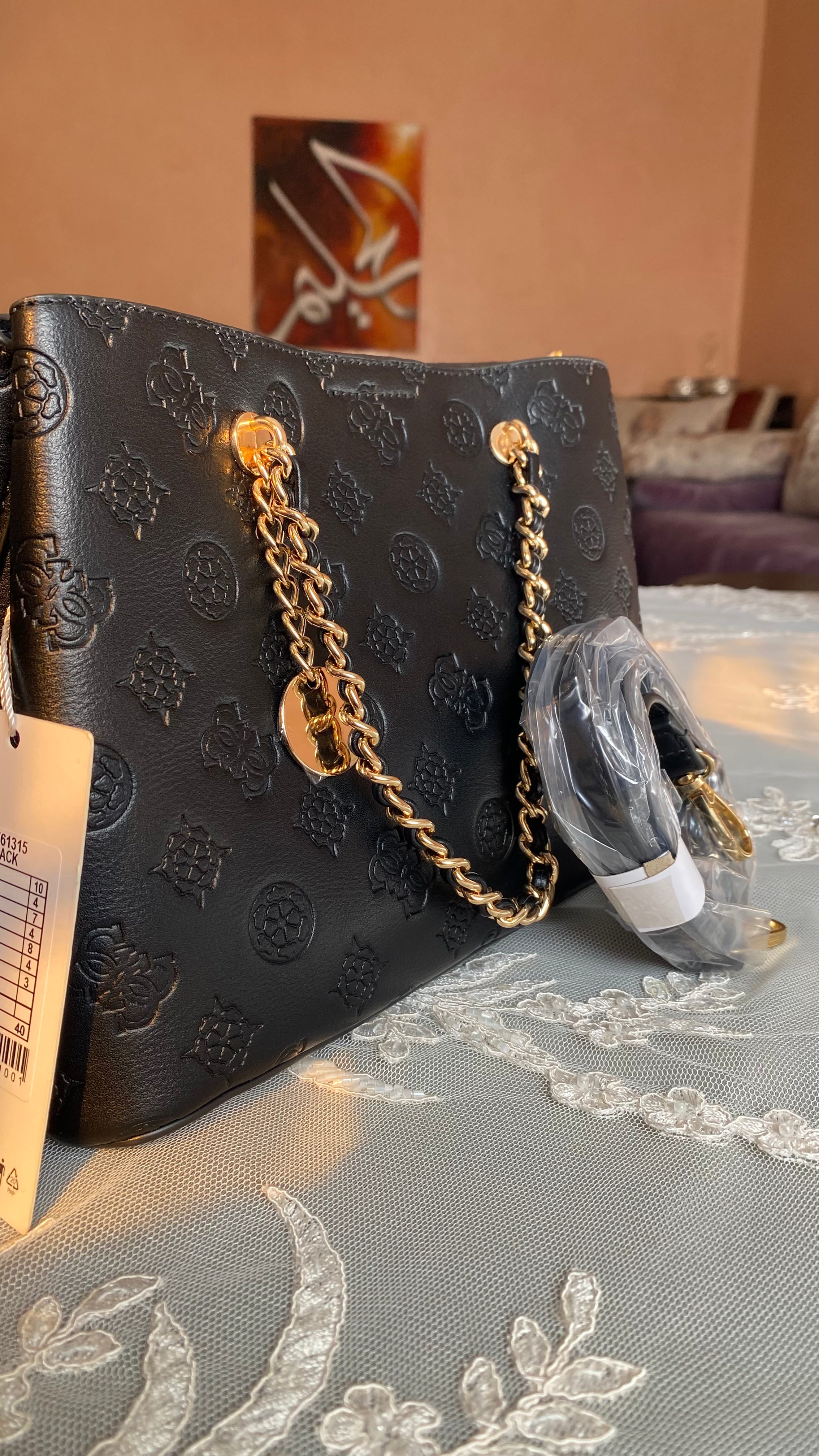 Sac noir avec chaine dorée plus bandoulière